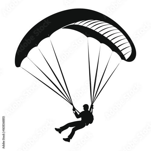 Silhouette of a Paraglider Descending Gracefully through the Air Harnessing the Wind for an Exhilarating Adventure