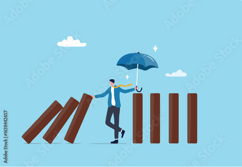 Control risk in investment crisis, failure prevention, stop domino effect, protection or solution to solve problem, stop uncertainty or insurance concept, businessman stop domino collapsing despair.