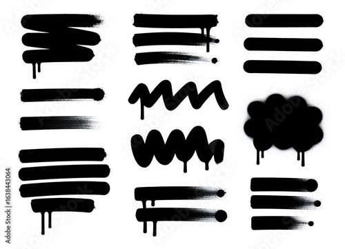Collection of black graffiti spray paint brush strokes and drips