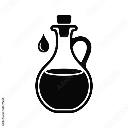 Black silhouette of a glass bottle with oil and a drop falling