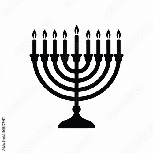 Silhouette of a menorah with nine lit candles