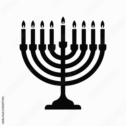 Black silhouette of a menorah with lit candles