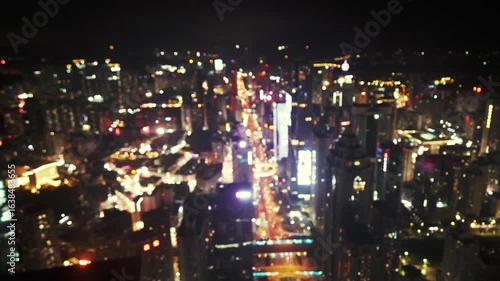 Wallpaper Mural Shenzhen, China. blurred city lights at night, with a bokeh effect that gives the image a dreamy quality. Torontodigital.ca