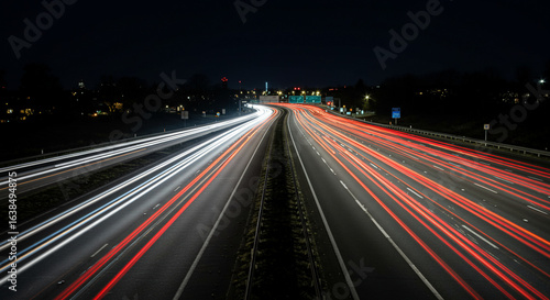 Wallpaper Mural Long exposure of highway at night with red and white streaks of light from passing cars Torontodigital.ca