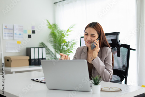 Businesswoman talking with customer with smooth business manner, smile