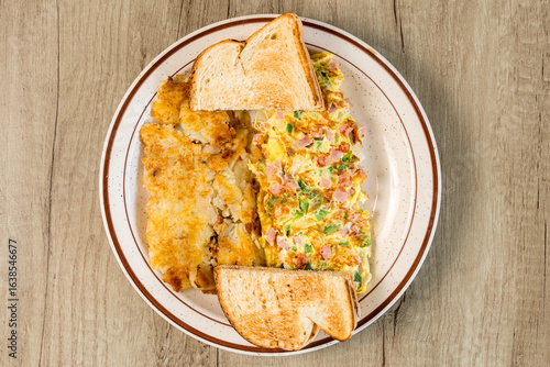 Canvas-taulu Western omelette with hash browns and toast