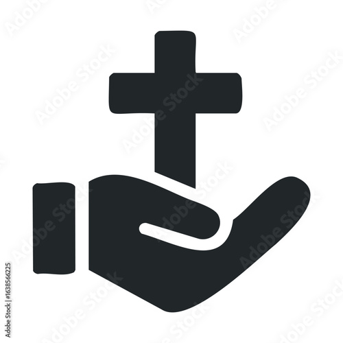 Silhouette of a hand holding a christian cross symbolizing faith and religion