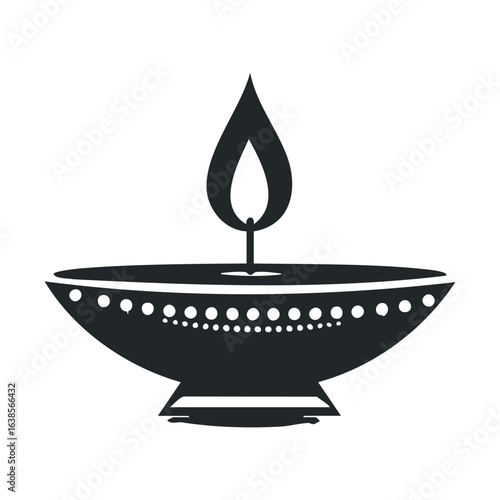 Black and white silhouette of traditional oil lamp with flame