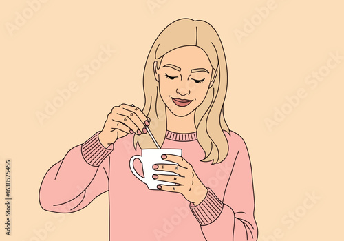 Young woman with blond hair wearing a pink sweater, holding and stirring a mug of hot beverage, conveying relaxation and comfort