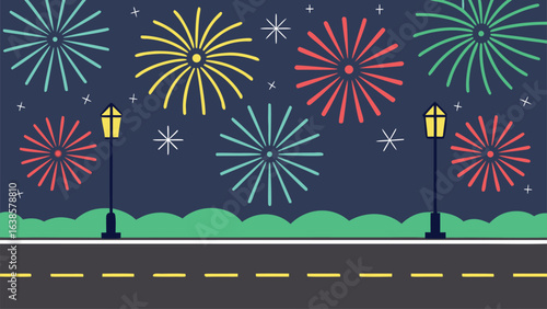 Colorful fireworks explode over a dark night sky with streetlights and road celebration explosion