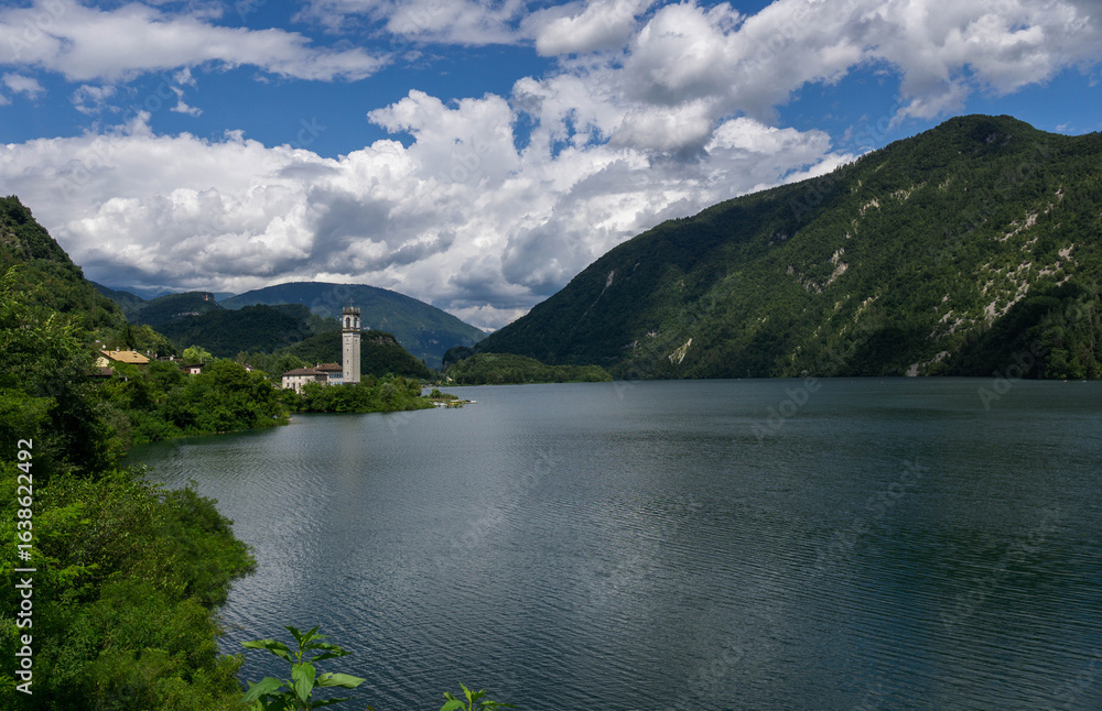 Fototapeta premium Lago del Corlo with Ponte della Vittoria Bridge in Belluno Italy