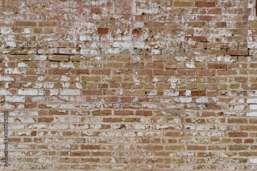 Old red brick wall to prison.
