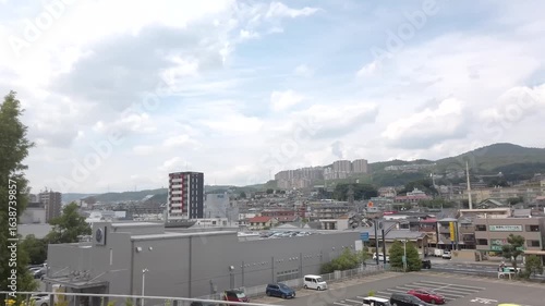 Takarazuka City, Hyogo Prefecture, Japan, August 8, 2025. A view of Sumiregaoka and the surrounding area taken from the rooftop of the Takarazuka Cultural Center. PAN shot