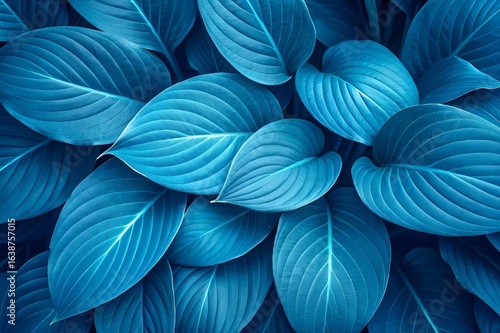 Wallpaper Mural Vibrant Blue Tropical Leaves Background – Exotic Nature Foliage Pattern. Torontodigital.ca