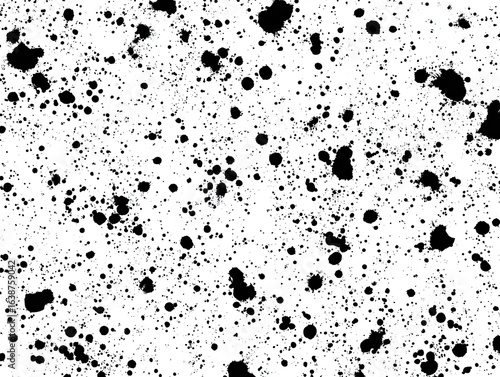 Abstract black ink splatter pattern on white background