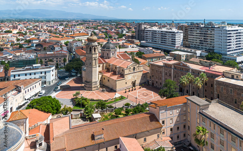Aerial view of the Oristano Cathedral in Sardinia, Italy - Baroque cathedral dedicated to the Assumption of the Virgin Mary with a bell tower topped by an onion dome covered with maiolica