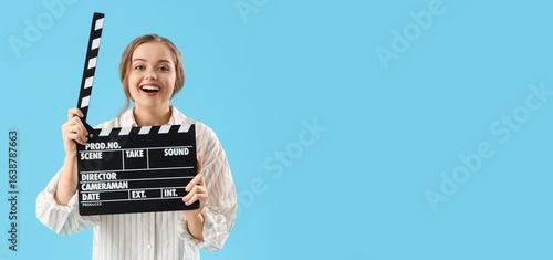 Beautiful actress holding m...