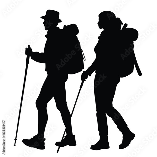 Hikers with backpacks and poles hiking trekking