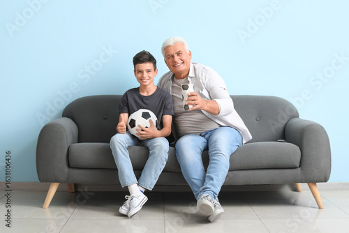 Little boy with his grandfa...