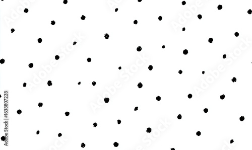 A scattered, simple pattern of black dots on a white background.  The dots vary slightly in size and are unevenly distributed, creating a subtle visual texture