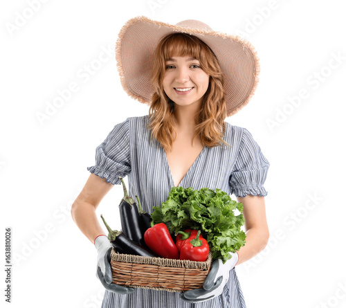 Happy young female farmer w...