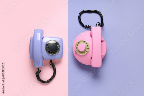 Retro telephones on color b...