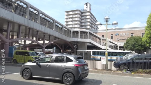 August 8, 2025, Takarazuka City, Hyogo Prefecture, Japan. Scenery around JR Takarazuka Station. Pan shot