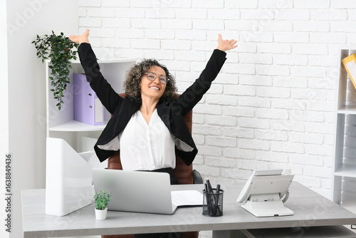 Happy mature businesswoman ...