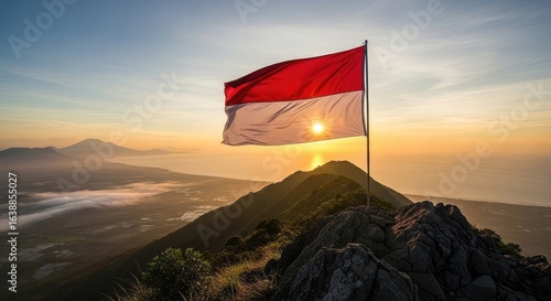 National flag waving over sunrise landscape