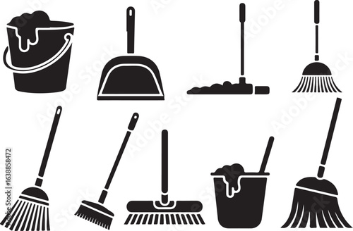 Collection of black cleaning tools and buckets with suds broom