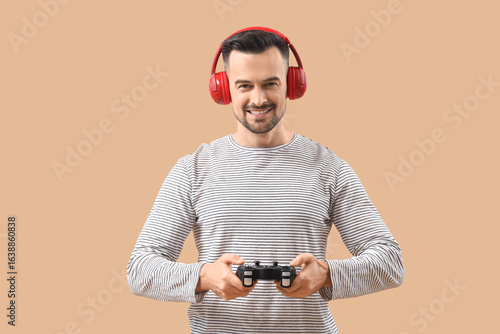 Handsome man in headphones ...