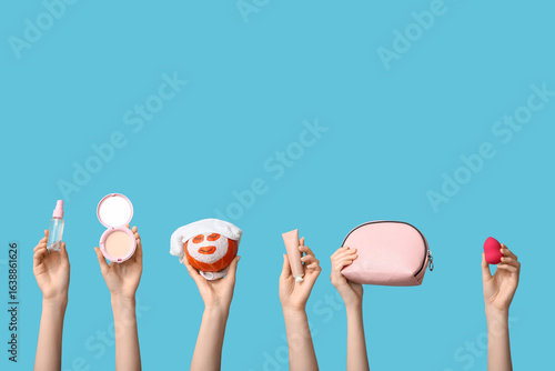 Women holding funny pumpkin...