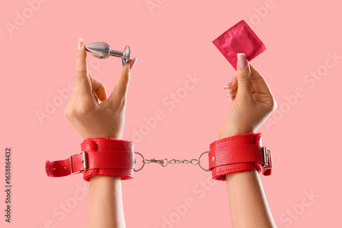 Female hands in red leather...