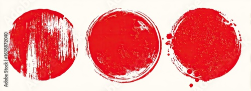 Three circular, red, paint-like stains on a white background.  Brushstrokes and splatters are visible on the red