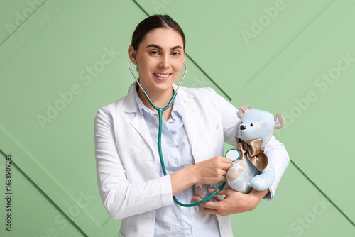 Pediatrician doctor examini...