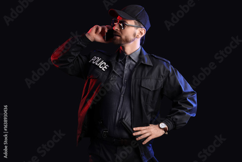 Male police officer talking...