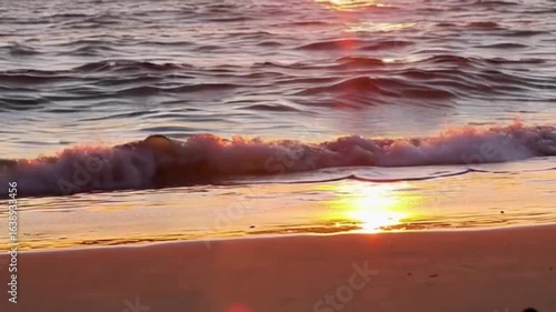 Golden Sunset Over Gentle Ocean Waves