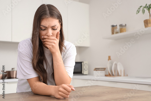 Young woman having panic at...