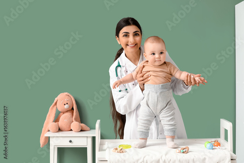 Female pediatrician with li...
