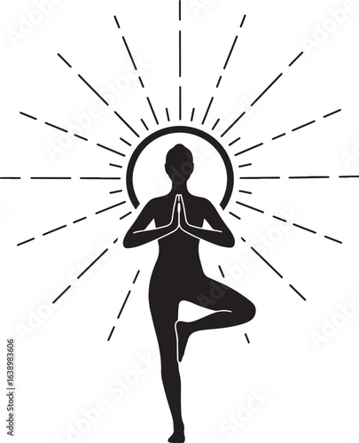 Woman in tree pose yoga position with sunburst silhouette