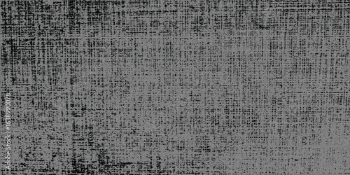 Abstract grunge texture with distressed crosshatch pattern in gray and black, perfect for vintage, industrial, or modern backgrounds.