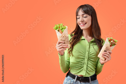 Young woman with tasty sand...