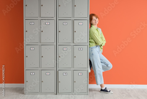 Teenage student near locker...