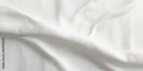 Wallpaper Mural Close-up of smooth, white fabric with gentle folds and fine textured weave creating soft shadows and highlights Torontodigital.ca