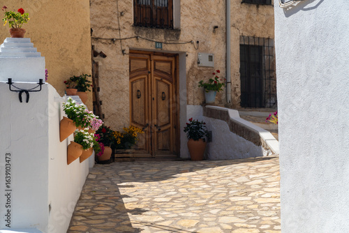 Beautiful old street in Molinicos village, Castilla la Mancha, Spain.