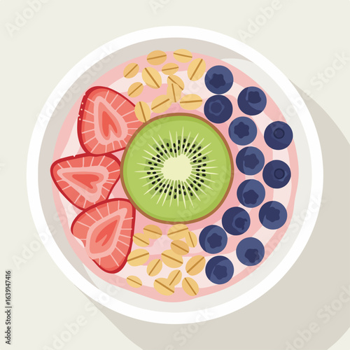 Refreshing smoothie bowl with fresh strawberries, kiwi, and blueberries viewed from above. This vibrant smoothie bowl features colorful toppings like oats and fruit, arranged artfully.