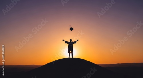 Wallpaper Mural Silhouette of Graduate Celebrating at Sunset, Throwing Graduation Cap on Hilltop Torontodigital.ca