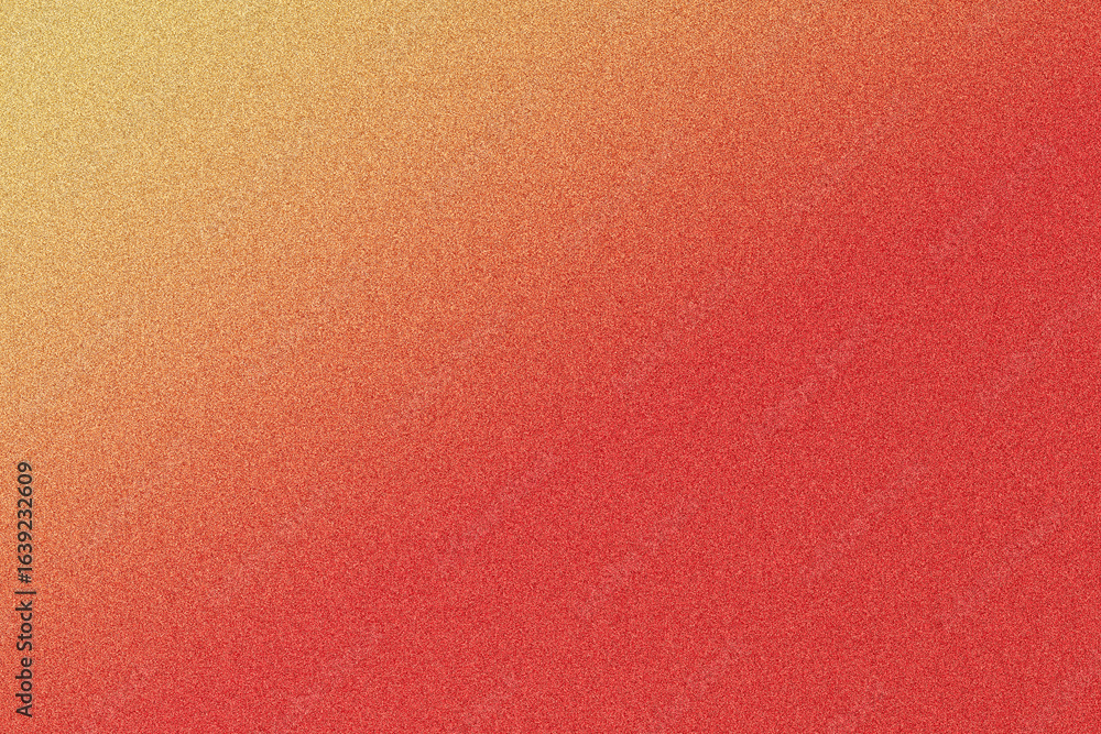 Fototapeta premium Warm gradient transitioning from soft yellow to vibrant red with a subtle textured pattern overlay creating depth