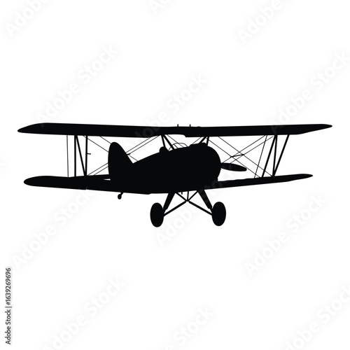 Silhouette of a biplane aircraft in flight airplane