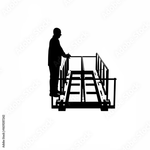 Senior automation specialist supervising installation of technology